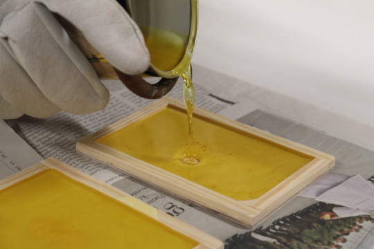 Wachstäfelchen werden gegossen